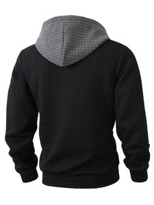 Rear view of men's waffle texture hoodie with black and grey color blocking details