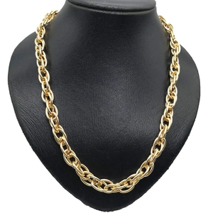 Close-up of a 1cm wide KC gold twist rope chain necklace on a black jewelry bust display
