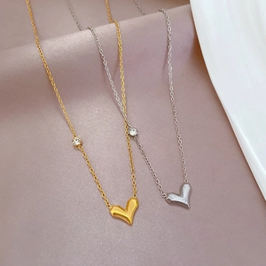 Minimalist titanium steel heart pendant necklaces in gold and silver finish with zircon
