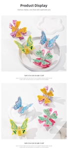 Detail of colorful butterfly hair clips with shimmering rhinestones in four gradient colors