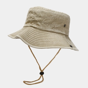 Detailed view of the adjustable chin strap and Sun Shade embroidery on khaki outdoor hat