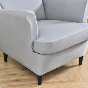 Elastic light gray wingback chair cover for all seasons in soft velvet textured fabric