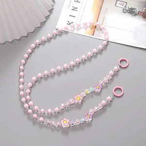 Pink and clear beaded crossbody phone lanyard with colorful flower charms and metal rings