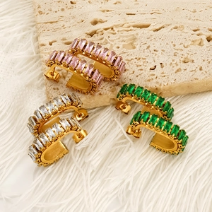 Three pairs of gold stainless steel C-shaped earrings with pink, white, and green zircons