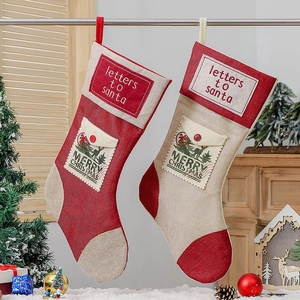 Pair of beige and red Christmas stockings with letters to Santa embroidery and elk stamps
