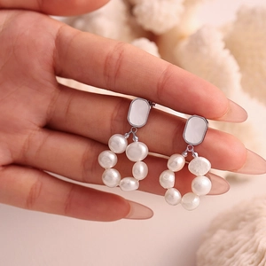 Elegant freshwater pearl hoop earrings with silver-edged square white enamel studs