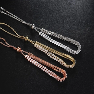 Three rows of adjustable tennis bracelets in silver, gold, and rose gold with zircon stones