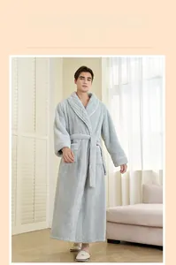 Detailed close-up of thick sky blue flannel bathrobe featuring white fleece lining