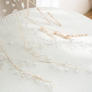 Christmas acrylic snowflake beads on gold and silver threads for tree decoration