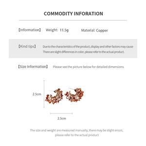 Detailed size information for copper beaded hoop earrings weighing 11.5 grams and 2.5 cm tall