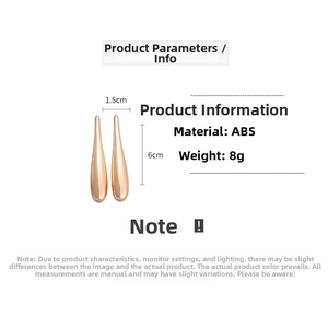 Detail showing high-polish rose gold drop earrings with dimensions 1.5cm by 6cm