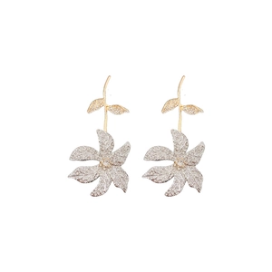 Sparkling crystal flower stud earrings with golden leaves on a clean white background