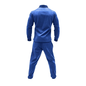 Back view of a blue velvet track suit featuring a lapel jacket and matching trousers