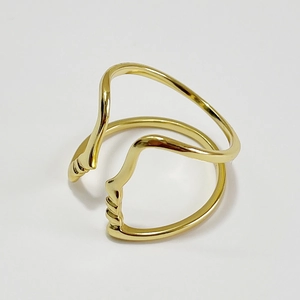 Minimalist S925 sterling silver ring with abstract face design in a golden wavy finish