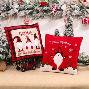 Christmas gnome pillow covers with red plaid pattern and festive holiday greeting print