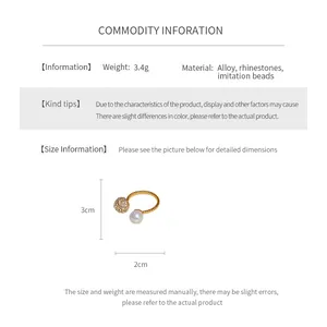 Size chart showing 3cm height and 2cm width for this elegant pearl and rhinestone open ring