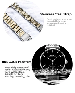 Detail of silver and gold stainless steel watch band and 30m waterproof black dial