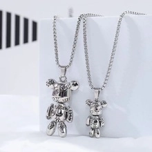 Detail of silver titanium square snake chain with 3D peace and love bear pendants