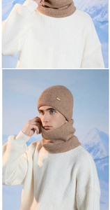 Detail of khaki knit beanie and neck warmer set with metal DIK logo for winter