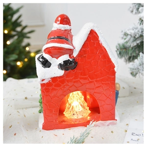 Ceramic Christmas snow house ornament with Santa and glowing crystal tree detail