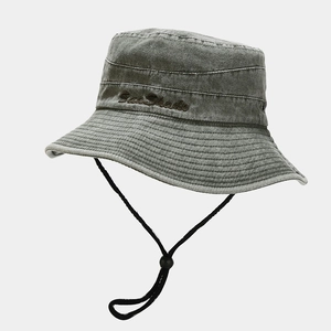 Detailed view of Sun Shade embroidery and vintage washed texture on the grey outdoor hat