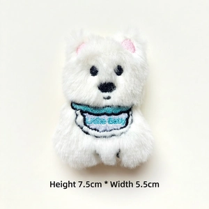Detail of cute white plush dog brooch with Little Baby embroidery, height 7.5cm width 5.5cm