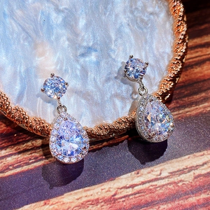 Elegant water drop earrings with AAA cubic zirconia and halo emerald green stone accents