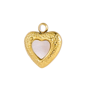 Detailed view of a hammered gold heart pendant with a white mother-of-pearl inlay