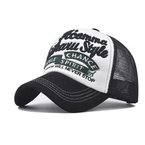 Close-up of 3D embroidery detail and contrast stitching on the mesh trucker cap brim