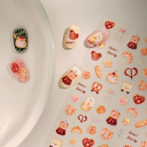 Japanese style nail art stickers featuring cute brown bears and miniature bread designs