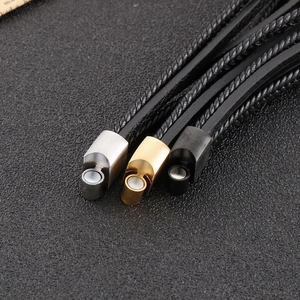 Detailed macro view of magnetic clasps in silver, gold, and black for braided leather bracelets