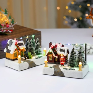 Lighted musical Christmas snow village house with LED lights and Santa figurines