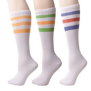 Detailed close-up of cotton knit striped mid-calf socks with orange and blue bands