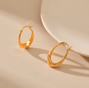 French vintage hammered oval hoop earrings with 18K gold plating and irregular texture