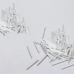 Close-up of silver-tone metal ear studs posts for DIY jewelry making accessories