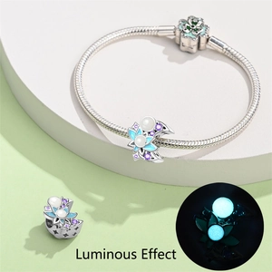 Detailed view of S925 silver lotus moon charm with purple zircon and luminous effect