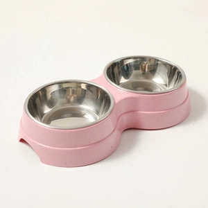 Detail of pink double pet bowl with removable stainless steel liners for cats and dogs
