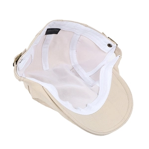 Detail of 100% cotton beige flat cap showing white inner lining and adjustable metal buckle