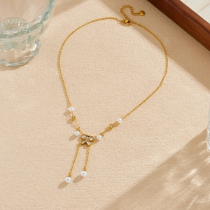 Elegant gold stainless steel butterfly necklace with pearl tassels and zircon accents
