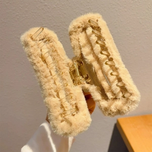 Beige plush faux fur square claw clip for women featuring a minimalist aesthetic