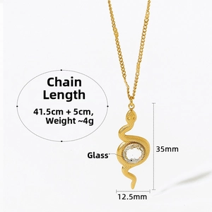 Detail view of gold snake pendant with glass inlay showing 35mm height and 41.5cm chain