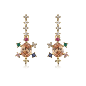 Detailed macro view of gold sunburst earrings with colorful zircon and champagne stone