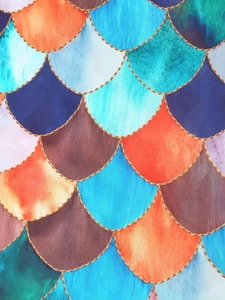 Close-up of shimmering mermaid scale pattern with vibrant gradient colors and gold outlines