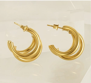 Detailed view of 18K gold-plated irregular triple-layer C-shaped hoop earrings