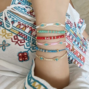 Bohemian handmade beaded bracelet set with colorful glass beads and adjustable cord