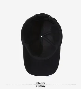 Interior view showing the thick lining and protective ear flaps of the black winter cap