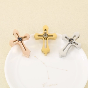 Polished stainless steel projection cross necklace in rose gold, gold, and silver finishes