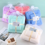 Soft coral fleece towel set in ribbon-tied gift mesh bag with waffle texture
