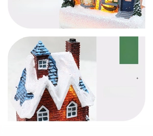 Detail of glowing Christmas snow house with red brick walls and LED lighted windows