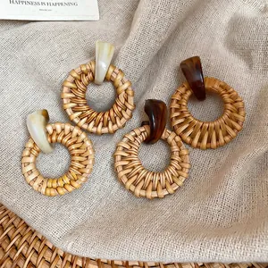 Bohemian geometric woven drop earrings in cream white and tortoiseshell resin patterns